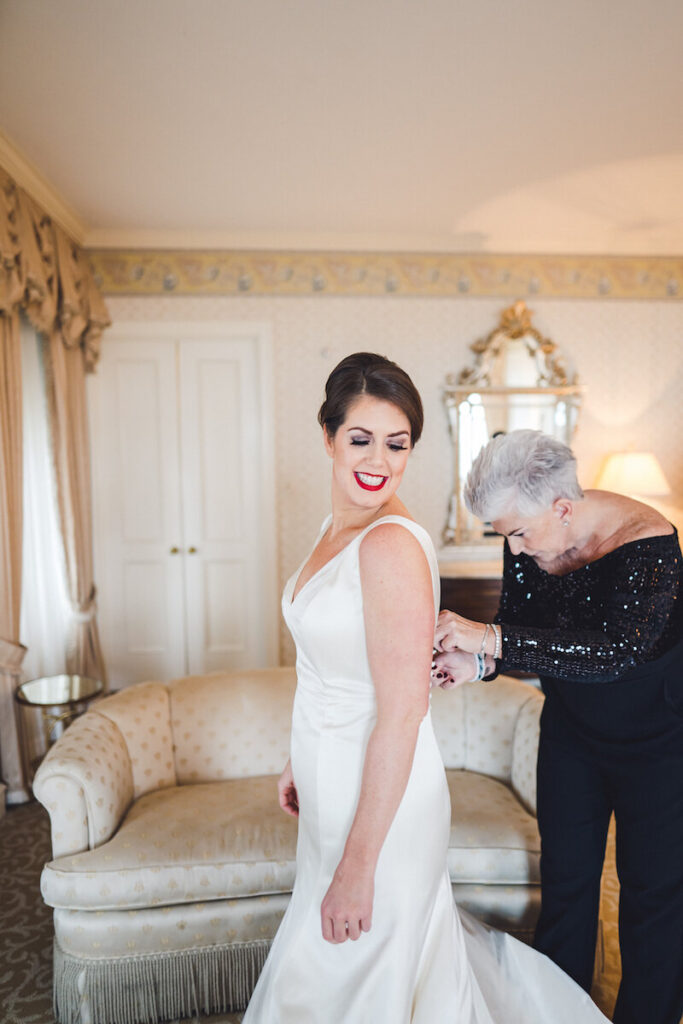 Bride getting ready in The Drake Hotel’s Princess Diana Suite.
