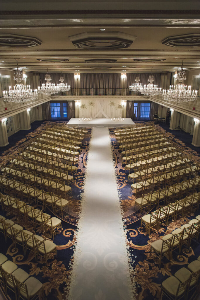 Elegant blush and ivory wedding ceremony decor at The Drake