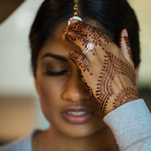Indian bride with updo and henna