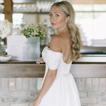 Teased crown hair with curls for brides