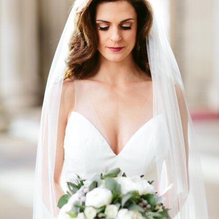 big soft waves and veil on bride